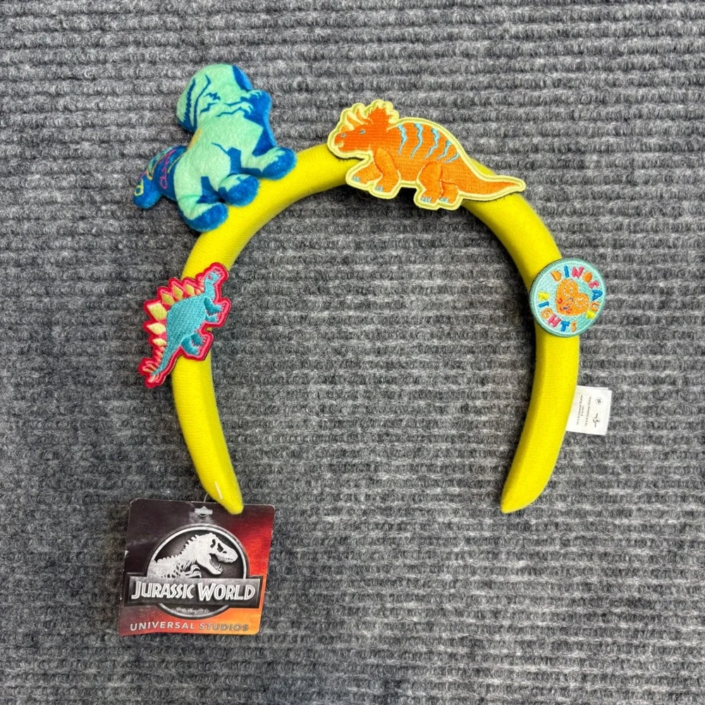 Jurassic World Universal Studios Dinosaur Headband Yellow Plush Triceratops NWT